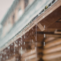 Rain water dripping off a house